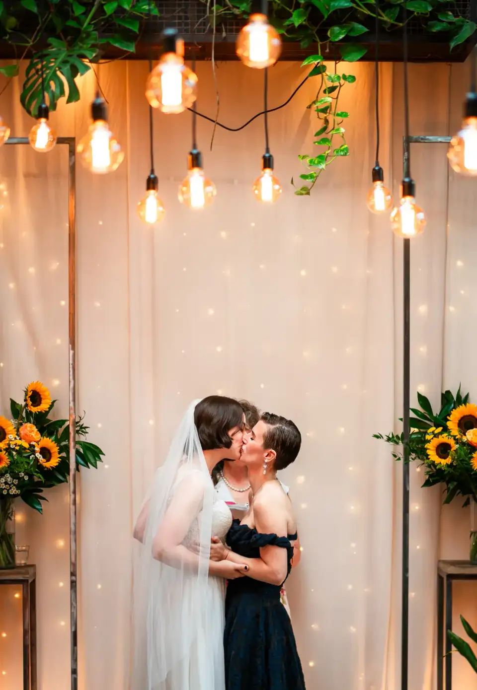 A ceremony backdrop of sunflowers.