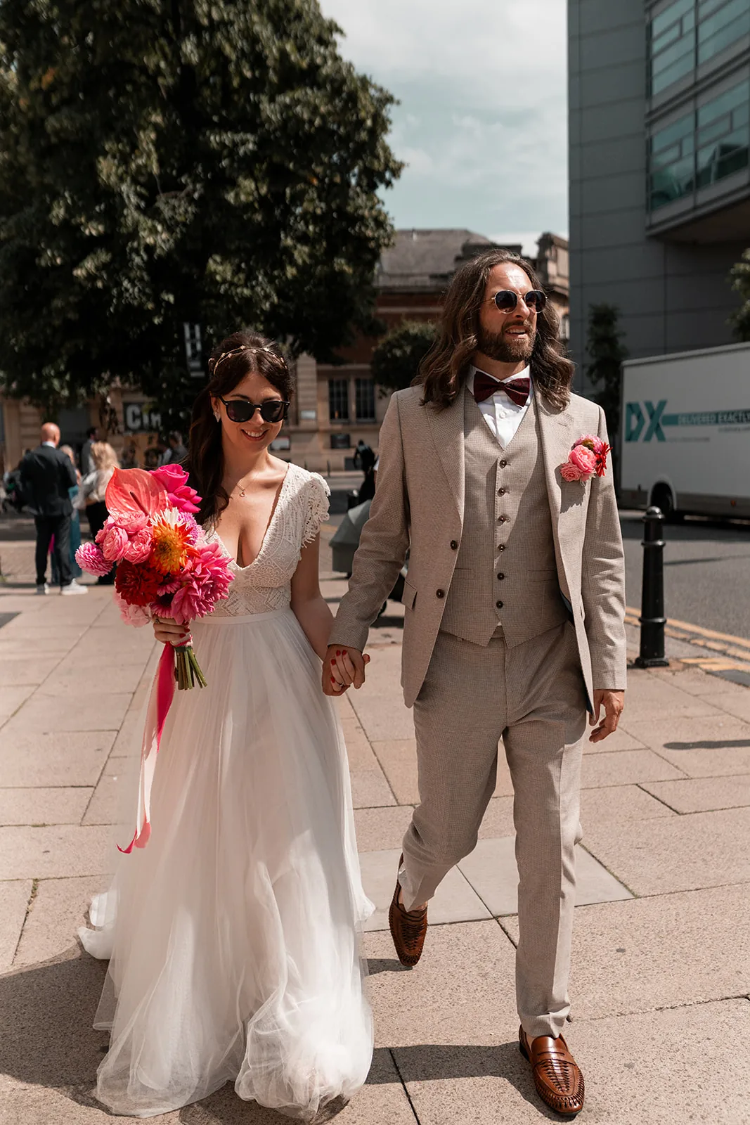 Couple walking through the streets of East London near The Hackney on Hackney Road